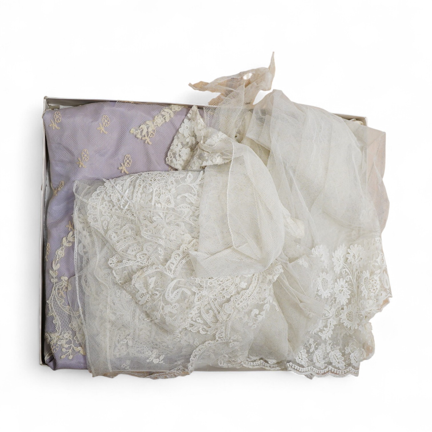 A small late 19th century Brussels wedding veil, an earlier Brussels bobbin bonnet veil, two needle run bonnet veils, various lace sleeves and a lilac silk and lace coverlet., Brussels veil 140cm x 132cm. Condition - the